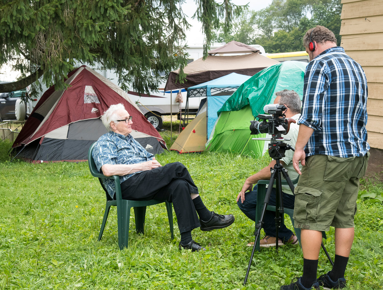 Known as the man who gave the Woodstock Concert its sound, recording and sound engineer, Bill Hanley is interviewed outside of the Yasgur  family farm house at the Yasgur Road Production’s campground and concert site.